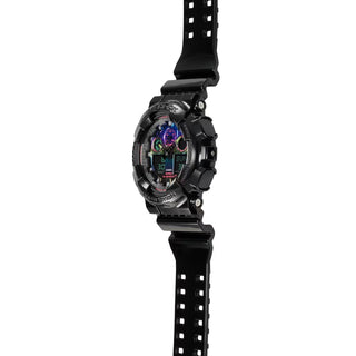 G-SHOCK GA100RGB-1A watch with glossy black bezel, multicolored face, and LED light.