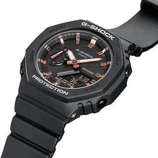 G-SHOCK GMAS2100-1A watch with matte black finish, metallic indices, octagonal design.